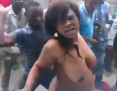 Alleged witch stripped naked